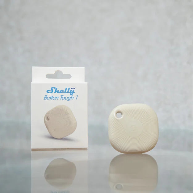 Shelly BLU Button Tough 1 — Instalado en exterior controlando iluminación de jardín
